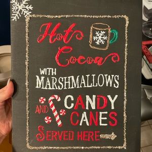 Christmas/holiday sign hot cocoa with marshmallows and candy canes